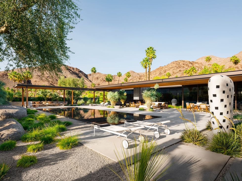 Flat Roof Clubbed with Wooden Interiors