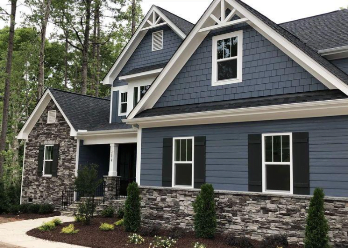 Blue Undertoned Grey Coloured Exterior with Wooden Accents