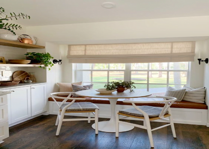 Intimate Breakfast Nook with a Bench by The Grid Window