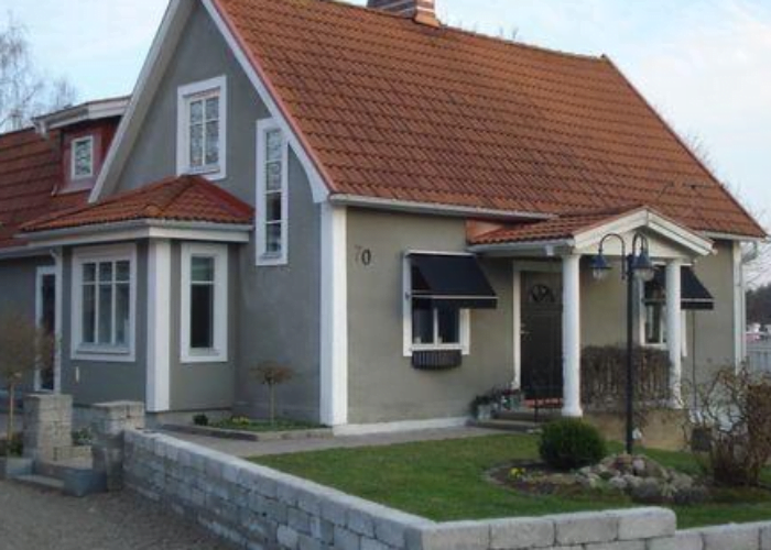 Modern Grey House Exterior Color Scheme with Shades of Red